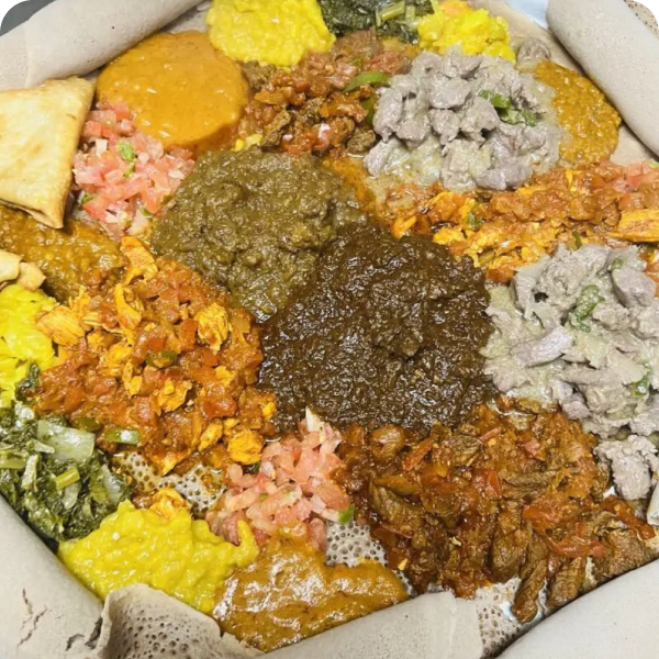 A bowl of food that includes rice, beans and other ingredients.